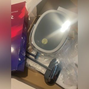 Wall mounted light up rechargeable double sided mirror